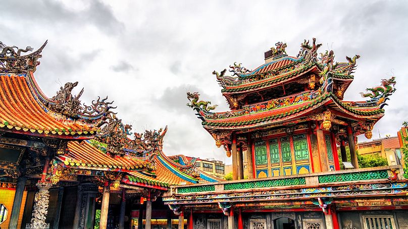 Visit Mengjia Longshan Temple in Taipei, Taiwan.