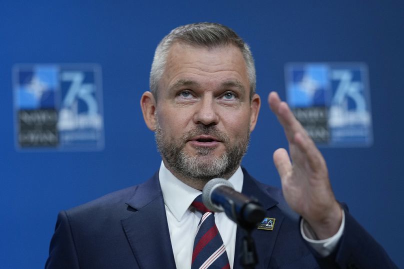 Slovakia's President Peter Pellegrini speaking to members of the media during his arrival at the NATO summit in Washington, Wednesday, July 10, 2024.