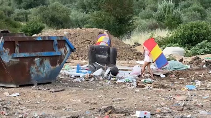 Roma children playing in a rubbish dump