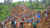 Hundreds of people gather at the site of a mudslide in the Kencho Shacha Gozdi district, Gofa Zone, southern Ethiopia.
