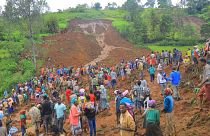 Hundreds of people gather at the site of a mudslide in the Kencho Shacha Gozdi district, Gofa Zone, southern Ethiopia.