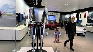 A non-working marketing model of Tesla Inc.'s proposed Optimus humanoid robot, aka Tesla Bot, is on display at the Westfield Garden State Plaza in Paramus, New Jersey