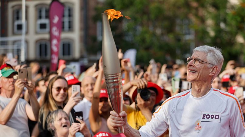 Arsene Wenger carries the Olympic torch in Strasbourg - 26 June 2024 