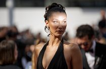 Bella Hadid poses for photographers upon arrival at the premiere of the film 'Beating Hearts' at the Cannes International Film Festival 2024