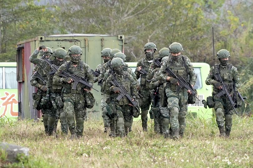 Taiwanese soldiers take part in drills at the Army defence command base in Taitung in southern Taiwan on Wednesday, Jan. 31, 2024.