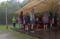 Туристы под дождем