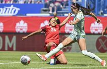 Mexico's Greta Espinoza, right, challenges Canada's Olivia Smith (26) during the first half of an international friendly soccer game in Montreal, Saturday, June 1, 2024