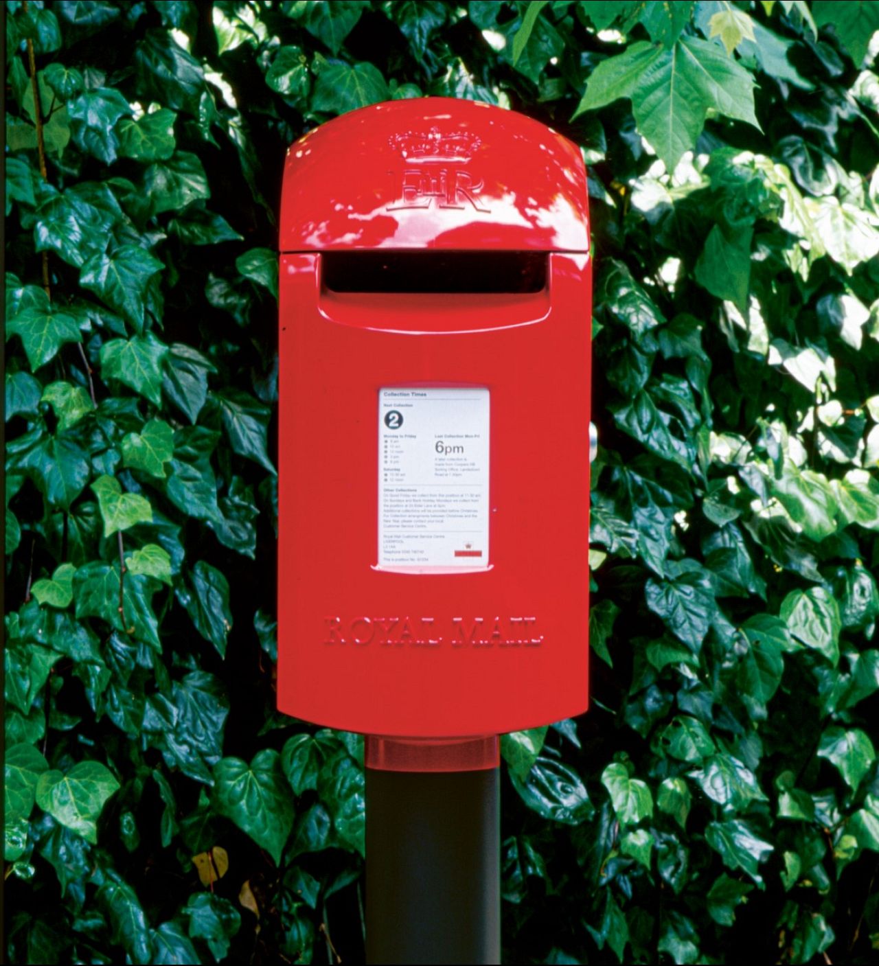 The shiny rural postbox, seen in situ on a leafy lane, was named the Bantam for its resemblance to the fuel tank of the classic red GPO Bantam motorcycle