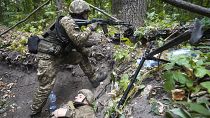 Ukrán katonák a lövészárokban 