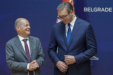 German Chancellor Olaf Scholz, left, and Serbian President Aleksandar Vucic leave after a press conference at the Serbia Palace in Belgrade, Serbia, Friday, July 19, 2024.