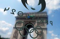 A view of the Arc de Triomphe though the window of a bus ahead of the 2024 Summer Olympics, Wednesday, July 24, 2024, in Paris, France. 
