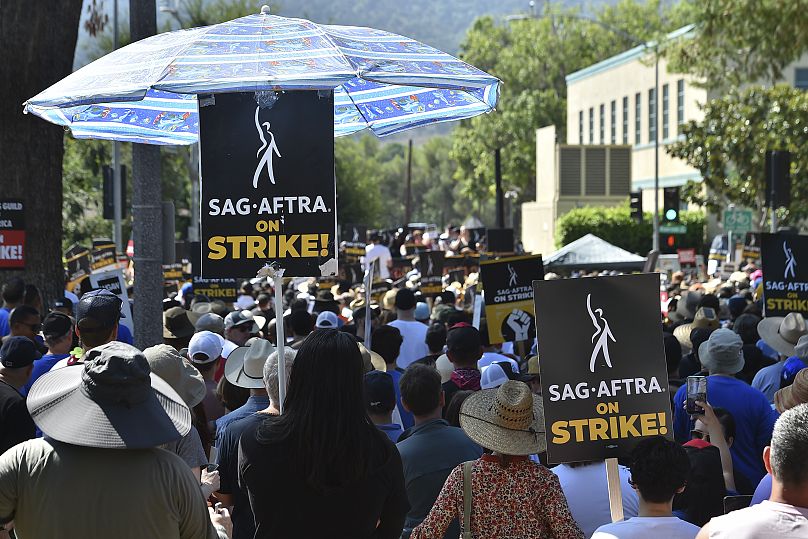 Attendees march at the Day of Solidarity union rally on Tuesday, Aug. 22, 2023