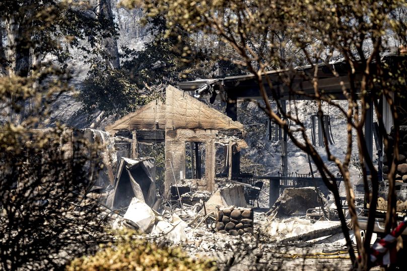 Walls stand at a residence destroyed by the Park Fire on Sycamore Valley Rd. near Chico.