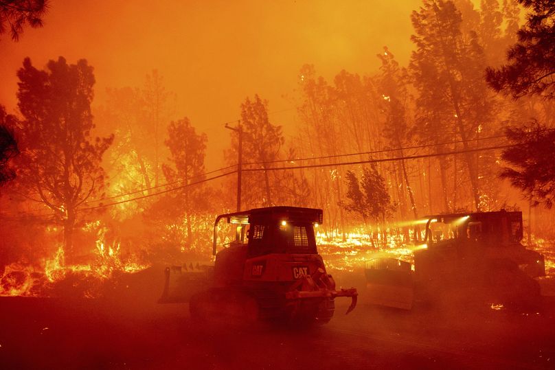 A hillside burns as the Park Fire tears though the Cohasset community in Butte County.