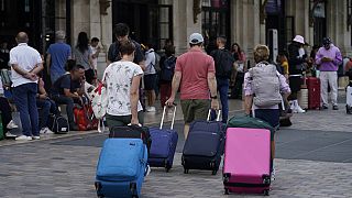 Travelers arrive at Gare de Bordeaux Saint-Jean at the 2024 Summer Olympics in Bordeaux, France, on Friday, July 26, 2024. Hours before the grand opening Olympics ceremony