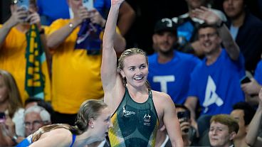 Ariarne Titmus, of Australia, celebrates after winning the women's 400-meter freestyle final at the 2024 Summer Olympics, Saturday, July 27, 2024, in Nanterre, France