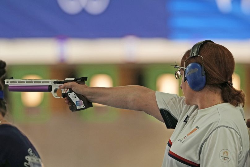 Georgia's Nino Salukvadze competes in the 10m air pistol women's qualification round at the 2024 Summer Olympics, Saturday,