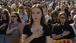 People sing the national anthem at a rally demanding the release of Ukrainian prisoners of war who are held in captivity in Russia, at Independence Square in Kyiv, Ukraine, Su