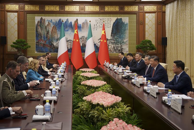 Chinese President Xi Jinping and his delegation attend a meeting with Italian Premier Giorgia Meloni.