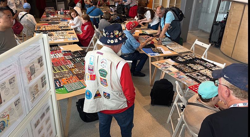 Many collectors wear many hats to display their pins. 