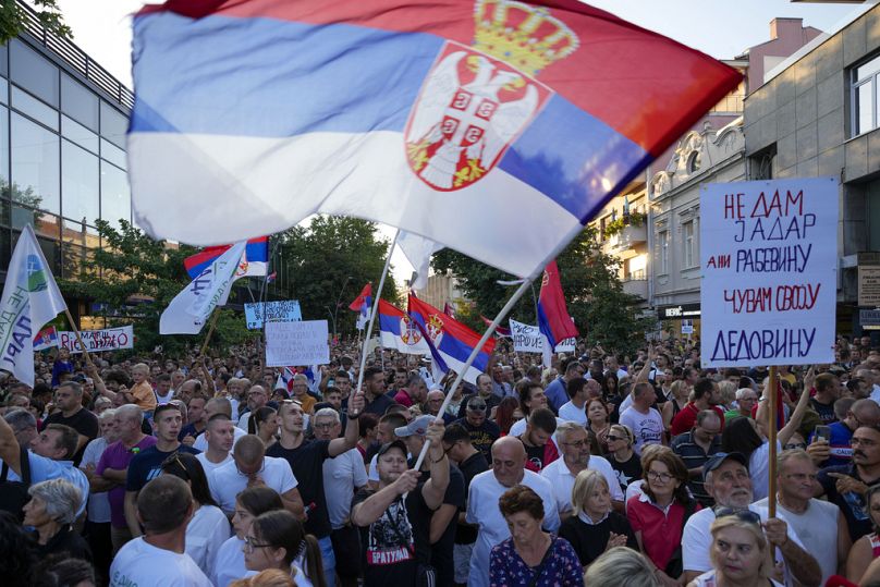 People attend a protest in Sabac, Serbia, Monday, July 29, 2024. 