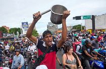 People protest the official election results declaring President Nicolas Maduro the winner of the presidential election