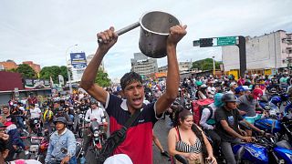 People protest the official election results declaring President Nicolas Maduro the winner of the presidential election