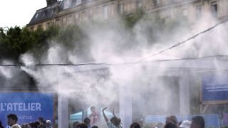 Fans brave scorching temperatures outside Paris Olympic events