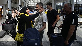 Libaneses en el aeropuerto.