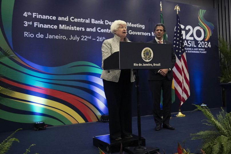 US Treasury Secretary Janet L. Yellen, left, speaks after signing a joint statement with Brazilian Economy Minister Fernando Haddad, right. 