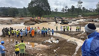 Rescuers stand near a bridge that got washed away in Tuesday’s landslides at Chooralmala, Wayanad district, Kerala state, India, Wednesday, July 31, 2024. 