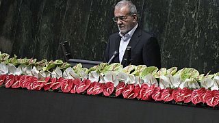 Newly-elected President Masoud Pezeshkian delivers a speech after taking his oath in a ceremony at the parliament in Tehran, Iran, Tuesday, 30, 2024.