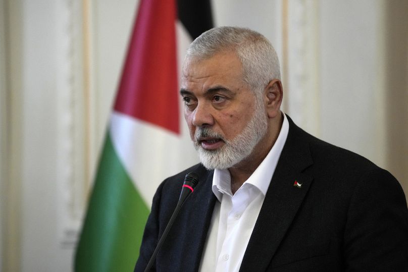 Late Hamas chief Ismail Haniyeh speaks during a press briefing in Tehran, Iran in March