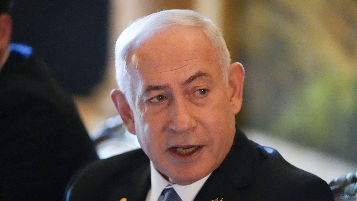 Israeli Prime Minister Benjamin Netanyahu speaks while meeting with Republican presidential candidate former President Donald Trump at his Mar-a-Lago estate, 26 July 2024