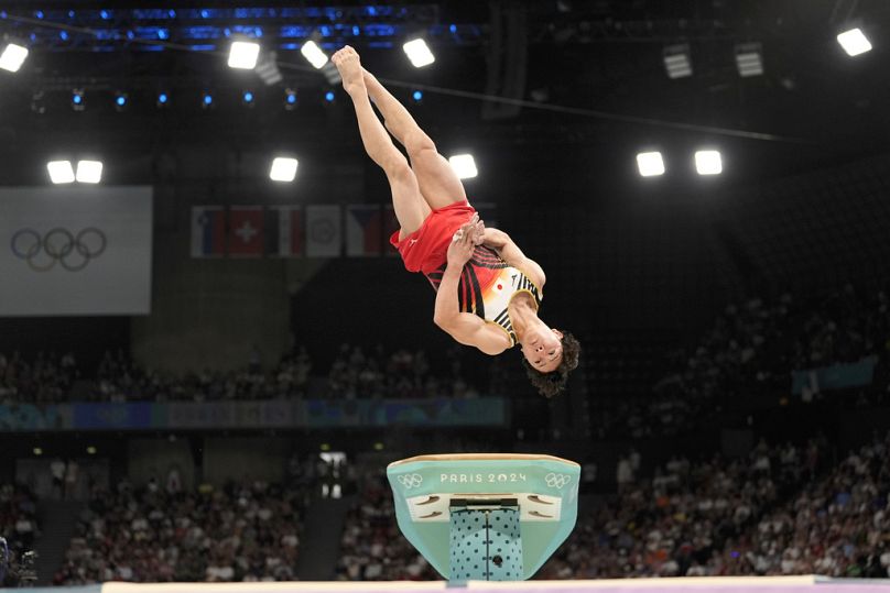 Shinnosuke Oka, of Japan, performs on the vault during the men's artistic gymnastics all-around finals in Bercy Arena at the 2024 Summer Olympics