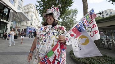Vivianne Robinson poses for a photo during the 2024 Summer Olympics in Paris, France, Tuesday, July 30, 2024. The Olympic super fan has attended seven Games over 40 years. 
