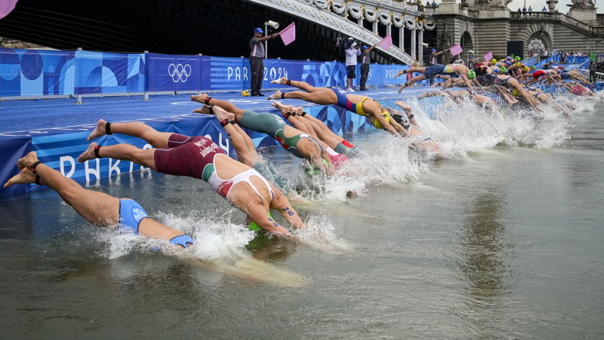 Athletes dive into the water for the start of the women's individual triathlon competition at the 2024 Summer Olympics on Wednesday - but would you?