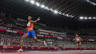 Sifan Hassan, of the Netherlands, wins the women's 10,000-meter run final at the 2020 Summer Olympics, Aug. 7, 2021, in Tokyo.