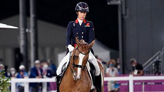 Britain's Charlotte Dujardin, riding Gio, competes in the equestrian dressage individual final at the 2020 Summer Olympics, 28 July 2021, in Tokyo. 