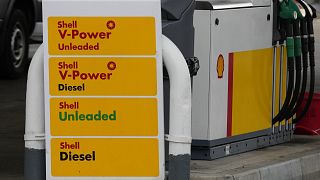 Signs at a shell petrol station in London