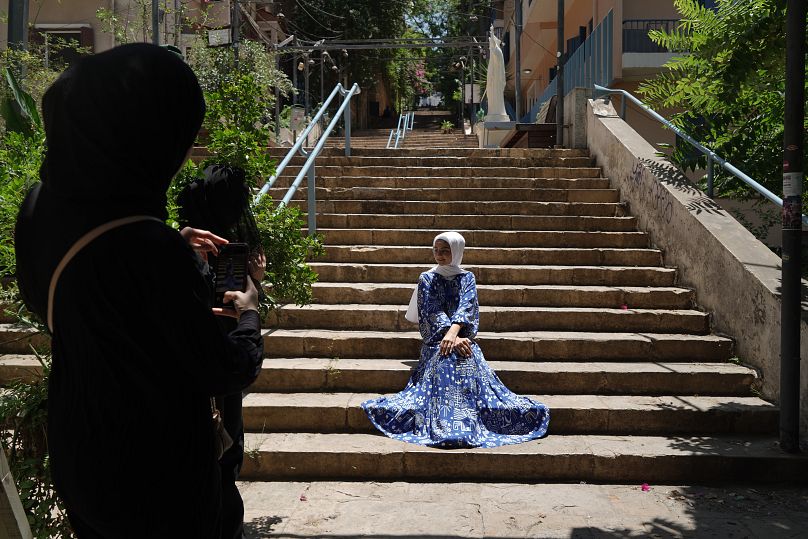 Fatima, an influencer, poses for the camera in Beirut, July 2024