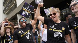 People take part in the SAG-AFTRA video game strike at Warner Bros. Games headquarters in Burbank, California on 1 August 2024. 