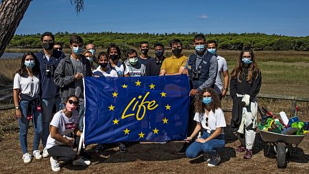 Volunteers with an EU-funded nature conservation project at Espaço Interpretativo da Lagoa Pequena, south of Lisbon, September 2020.