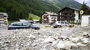 Rubble from a landslide caused by severe weather following storms that caused major flooding and landslide are pictured in Saas-Grund, Switzerland, Sunday, June 30, 2024. 