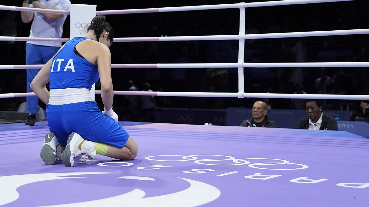 Italy's Angela Carini reacts after being defeated by Algeria's Imane Khelif, in their women's 66kg preliminary boxing match at the 2024 Summer Olympics, 1 August 2024