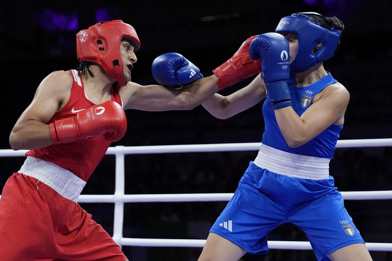 Algeria's Imane Khelif, left, fights Italy's Angela Carini in their women's 66kg preliminary boxing match at the 2024 Summer Olympics