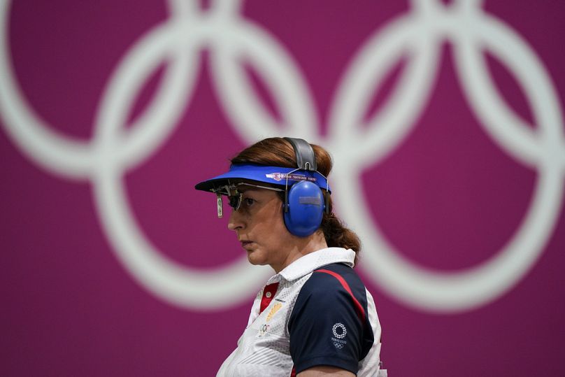 Nino Salukvadze, of Georgia, competes in the women's 10-meter air pistol at the Asaka Shooting Range in the 2020 Summer Olympics, July 25, 2021, in Tokyo, Japan.