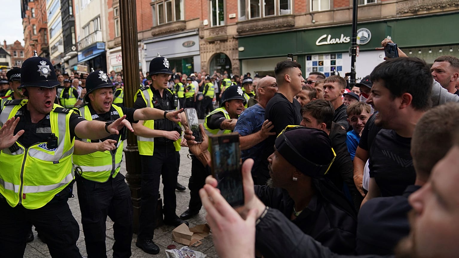 At least 100 arrested after violent clashes across the UK | Euronews