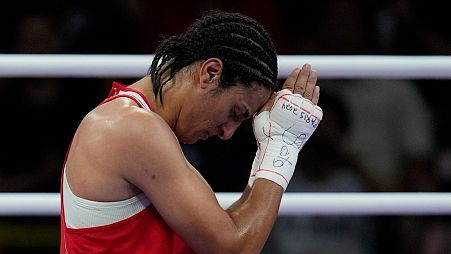 Algeria's Imane Khelif reacts after defeating Hungary's Anna Hamori in their women's 66kg quarterfinal boxing match at the 2024 Summer Olympics