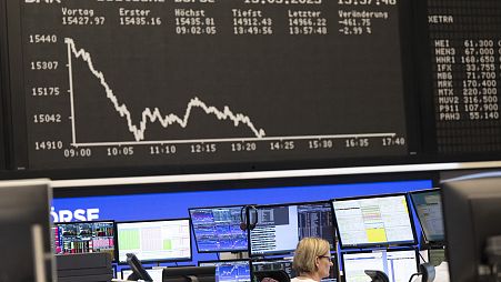 A stock exchange trader at the German Stock Exchange in Frankfurt, Germany